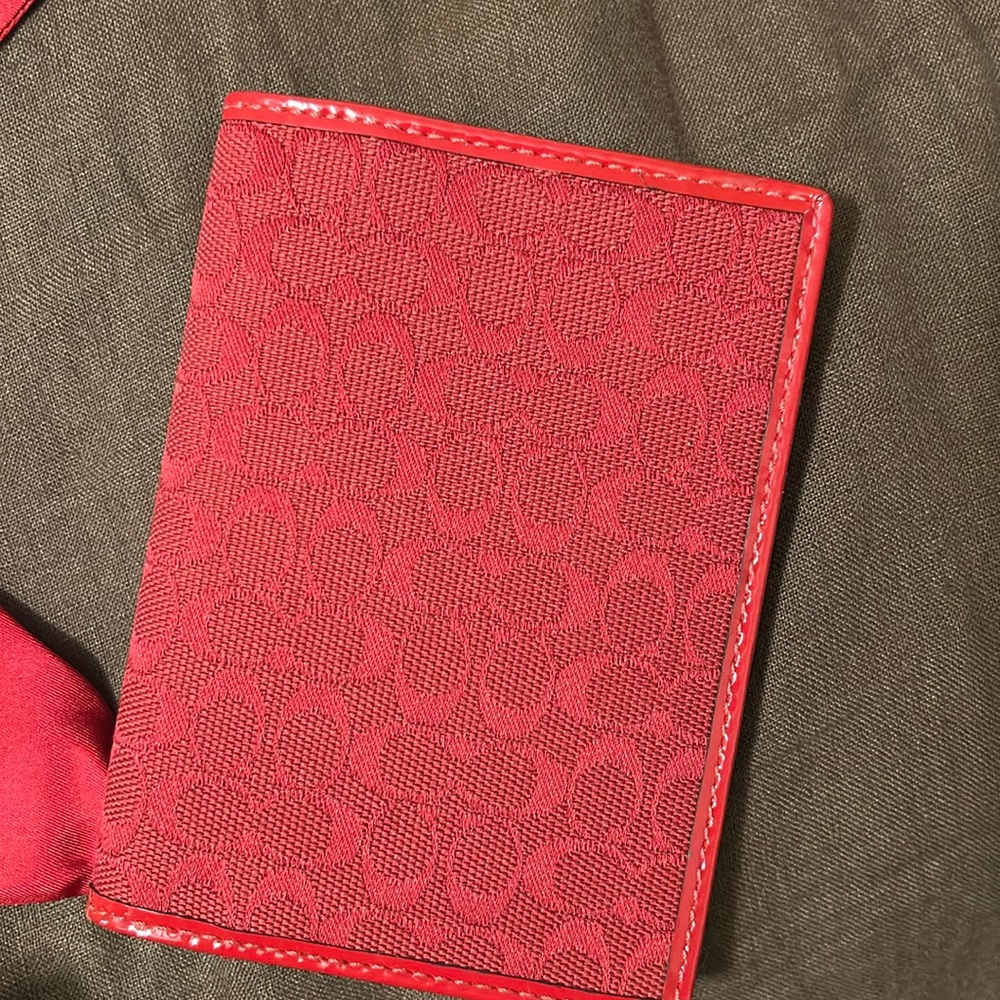 Coach red passport. New never used
